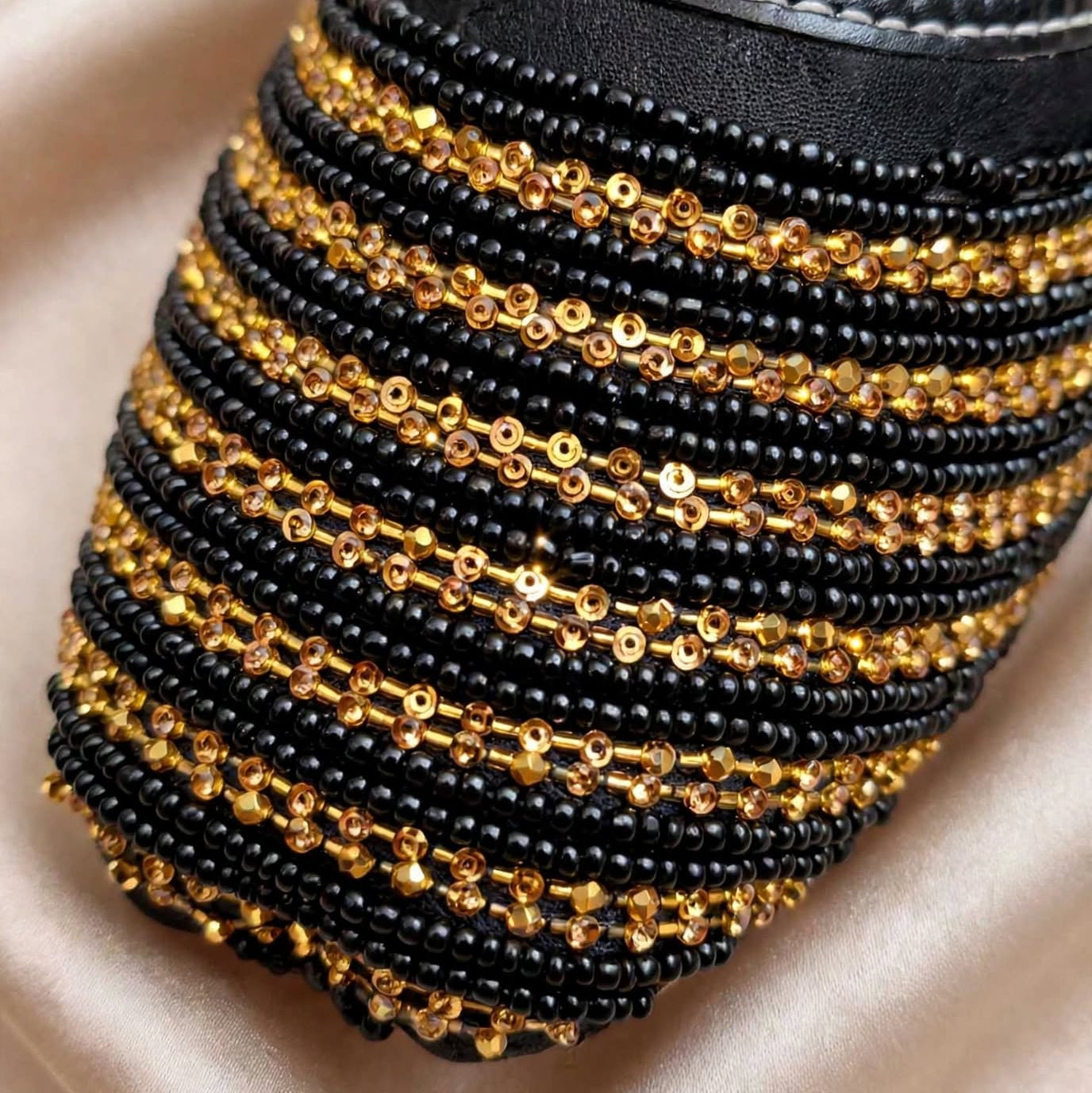 Black Golden Stripes Khussa - close-up of black and gold beadwork, Her Footwear Pakistan