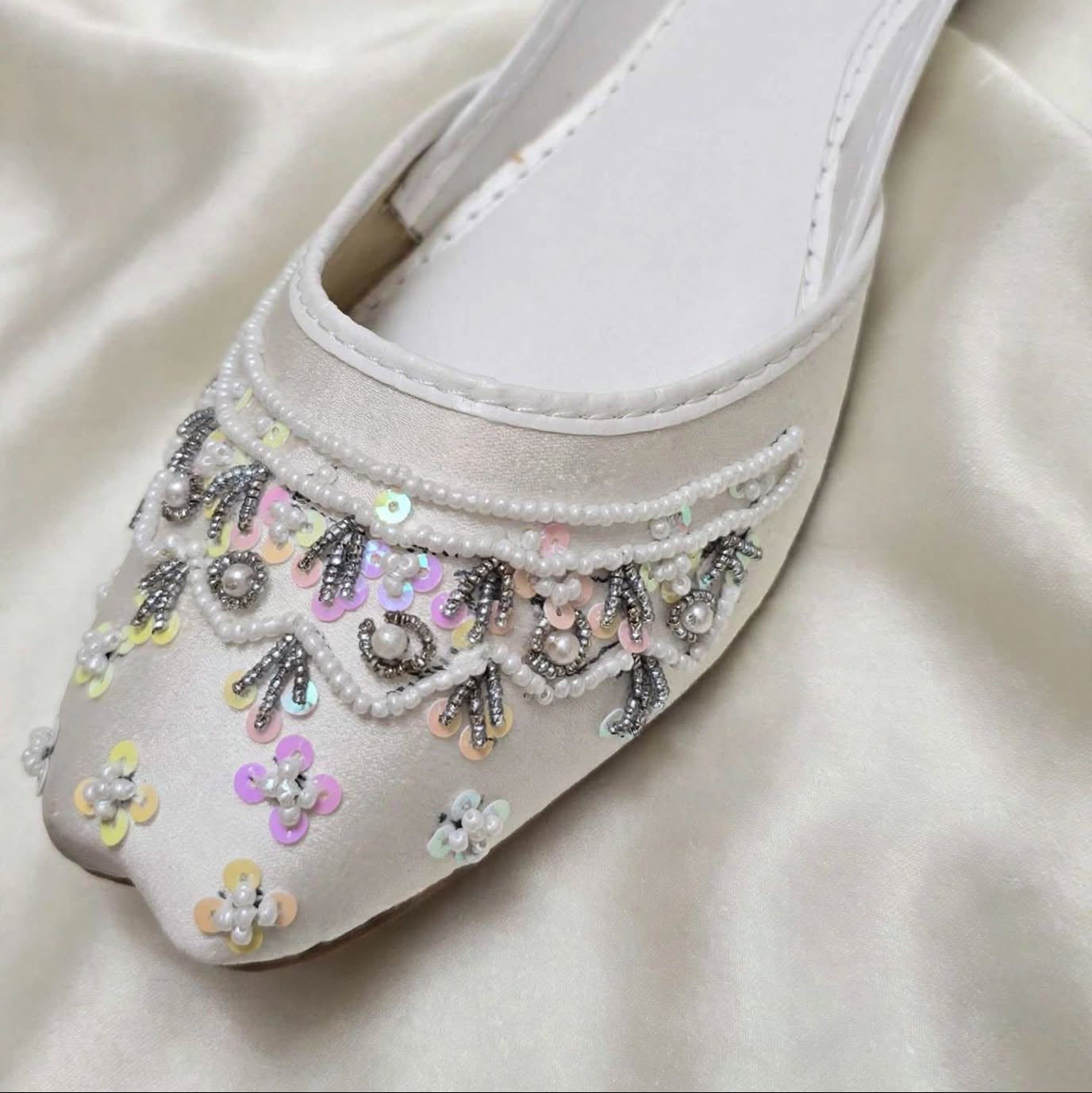 Ivory Rosette Bridal Khussa pair side view, Her Footwear
